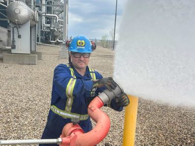 Rotaflow technician flow testing a fire hydrant