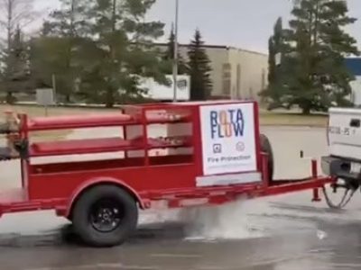 Rotaflow fire flow test trailer discharging water during hydrant maintenance